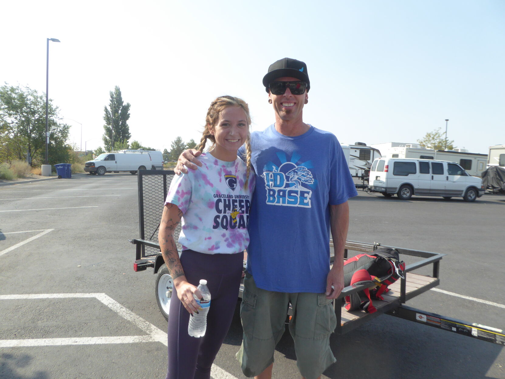 College student Rayann Otto poses with BASE jumper Sean Chuma prior to suiting up for their jump off the Perrine Bridge